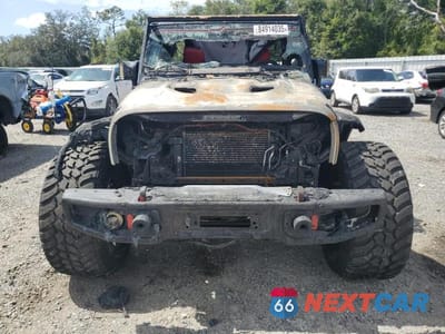 Piąte zdjęcie samochodu w środku: 2013 JEEP WRANGLER UNLIMITED SPORT VIN:1C4BJWDG3DL605022 - miniatura