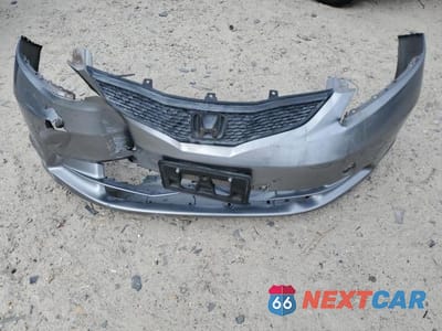 Zdjęcie 12 z 13 samochodu: 2010 HONDA FIT VIN:JHMGE8H28AS000725 - miniatura