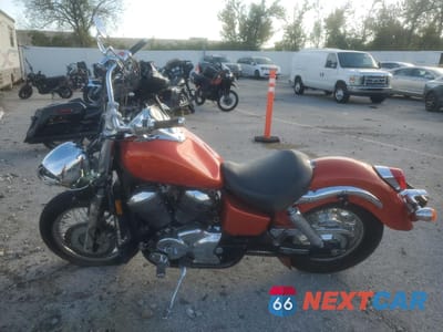 Trzecie zdjęcie samochodu z tyłu: 2003 HONDA VT750 CDD VIN:JH2RC44F83M102929 - miniatura