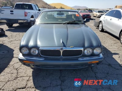 Piąte zdjęcie samochodu w środku: 1987 JAGUAR XJ8 VIN:SAJHD1043XC870061 - miniatura
