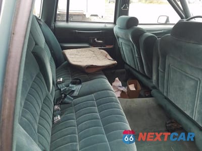 Zdjęcie 10 z 11 samochodu: 1994 LINCOLN TOWN CAR EXECUTIVE VIN:1LNLM81W9RY665394 - miniatura