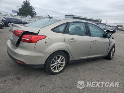Trzecie zdjęcie samochodu z tyłu: 2016 FORD FOCUS SE VIN:1FADP3F28GL397916 - miniatura