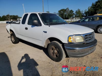 Czwarte zdjęcie samochodu z boku: 2003 FORD F150 VIN:1FTRX17203NB45949 - miniatura