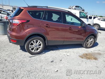 Trzecie zdjęcie samochodu z tyłu: 2018 FORD ESCAPE SE VIN:1FMCU9GD4JUA81475 - miniatura
