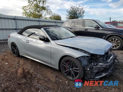 Czwarte zdjęcie samochodu z boku: 2022 BMW M440I VIN:WBA53AT08NCJ10750 - miniatura