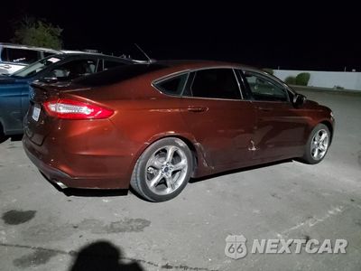 Trzecie zdjęcie samochodu z tyłu: 2016 FORD FUSION S VIN:3FA6P0G77GR134299 - miniatura