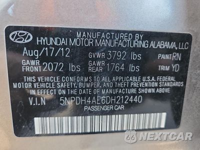 Zdjęcie 12 z 14 samochodu: 2013 HYUNDAI ELANTRA GLS VIN:5NPDH4AE6DH212440 - miniatura