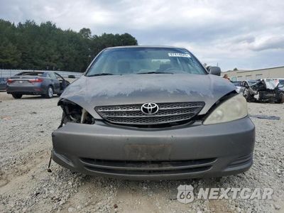 Piąte zdjęcie samochodu w środku: 2003 TOYOTA CAMRY LE VIN:4T1BE32K23U679031 - miniatura