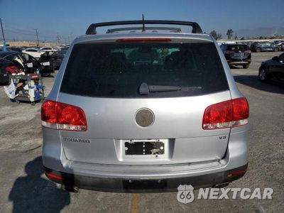 Zdjęcie 6 z 12 samochodu: 2006 VOLKSWAGEN TOUAREG 4.2 VIN:WVGZM77L16D054733 - miniatura