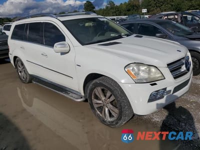 Czwarte zdjęcie samochodu z boku: 2010 MERCEDES-BENZ GL 350 BLUETEC VIN:4JGBF2FE4AA582472 - miniatura