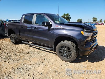 Czwarte zdjęcie samochodu z boku: 2024 CHEVROLET SILVERADO K1500 LT TRAIL BOSS VIN:3GCUDFEDXRG145527 - miniatura