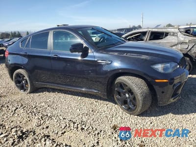 Czwarte zdjęcie samochodu z boku: 2012 BMW X6 M VIN:5YMGZ0C51CLL29635 - miniatura