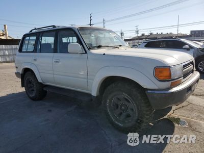 Czwarte zdjęcie samochodu z boku: 1991 TOYOTA LAND CRUISER FJ80 VIN:JT3FJ80W0M0022407 - miniatura