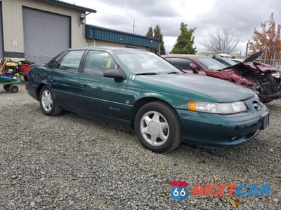 Czwarte zdjęcie samochodu z boku: 1994 FORD TAURUS SHO VIN:1FALP54P0RA250154 - miniatura