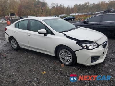 Czwarte zdjęcie samochodu z boku: 2017 SUBARU IMPREZA PREMIUM PLUS VIN:4S3GKAD67H3616155 - miniatura