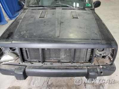 Zdjęcie 12 z 13 samochodu: 2001 JEEP CHEROKEE SPORT VIN:1J4FF48S61L629567 - miniatura