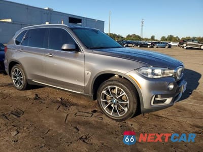 Czwarte zdjęcie samochodu z boku: 2017 BMW X5 XDR40E VIN:5UXKT0C32H0V97507 - miniatura