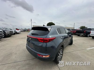 Czwarte zdjęcie samochodu z boku: 2017 KIA SPORTAGE EX VIN:KNDPNCAC1H7115753 - miniatura