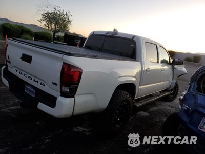 Trzecie zdjęcie samochodu z tyłu: 2020 TOYOTA TACOMA DOUBLE CAB VIN:3TMCZ5AN9LM359116 - miniatura