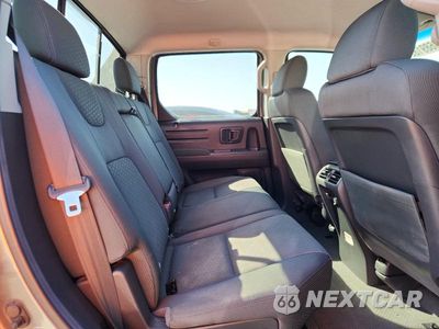 Zdjęcie 10 z 12 samochodu: 2009 HONDA RIDGELINE RTS VIN:5FPYK16489B100124 - miniatura