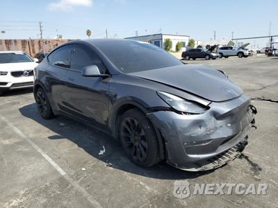 Czwarte zdjęcie samochodu z boku: 2023 TESLA MODEL Y VIN:7SAYGDED8PF971831 - miniatura
