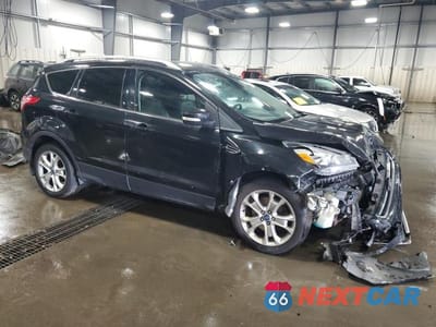 Czwarte zdjęcie samochodu z boku: 2014 FORD ESCAPE TITANIUM VIN:1FMCU9J93EUA05322 - miniatura