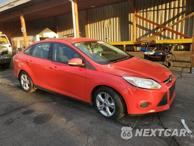 Czwarte zdjęcie samochodu z boku: 2014 FORD FOCUS SE VIN:1FADP3F27EL209433 - miniatura