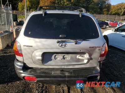Zdjęcie 6 z 13 samochodu: 2004 HYUNDAI SANTA FE GLS VIN:KM8SC13D44U691192 - miniatura