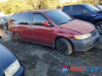 Czwarte zdjęcie samochodu z boku: 2002 HONDA ODYSSEY EXL VIN:2HKRL18022H535796 - miniatura