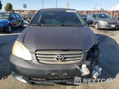 Piąte zdjęcie samochodu w środku: 2004 TOYOTA COROLLA CE VIN:1NXBR32E14Z271409 - miniatura