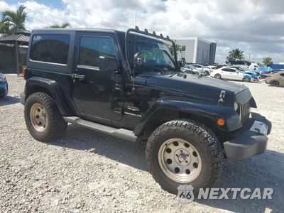 Czwarte zdjęcie samochodu z boku: 2011 JEEP WRANGLER SAHARA VIN:1J4GA5D16BL550388 - miniatura