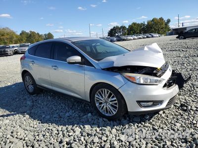 Czwarte zdjęcie samochodu z boku: 2017 FORD FOCUS TITANIUM VIN:1FADP3N26HL320464 - miniatura