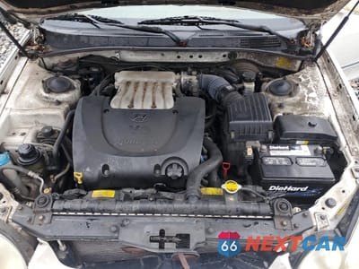 Zdjęcie 11 z 12 samochodu: 2002 HYUNDAI SONATA GLS VIN:KMHWF35H32A652192 - miniatura