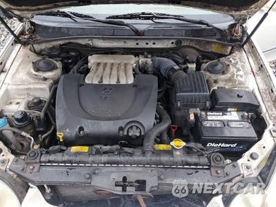 Zdjęcie 11 z 12 samochodu: 2002 HYUNDAI SONATA GLS VIN:KMHWF35H32A652192 - miniatura