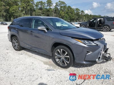 Czwarte zdjęcie samochodu z boku: 2018 LEXUS RX 350L BASE VIN:JTJGZKCA4J2006326 - miniatura