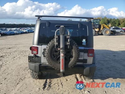 Zdjęcie 6 z 15 samochodu: 2017 JEEP WRANGLER SPORT VIN:1C4AJWAG8HL520747 - miniatura