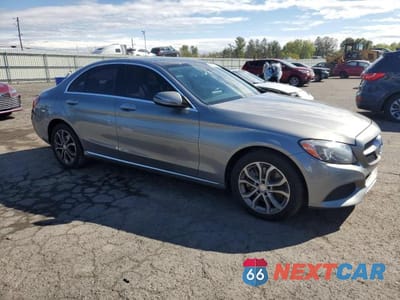 Czwarte zdjęcie samochodu z boku: 2016 MERCEDES-BENZ C 300 4MATIC VIN:55SWF4KB2GU154332 - miniatura