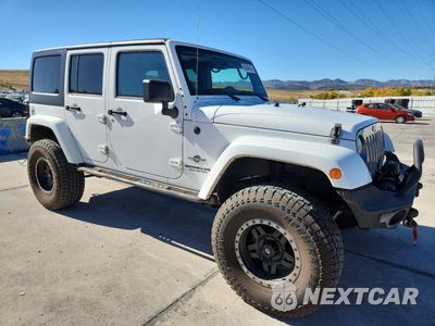 Czwarte zdjęcie samochodu z boku: 2014 JEEP WRANGLER UNLIMITED SPORT VIN:1C4BJWDG7EL199537 - miniatura