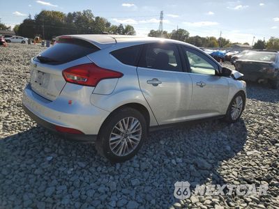 Trzecie zdjęcie samochodu z tyłu: 2017 FORD FOCUS TITANIUM VIN:1FADP3N26HL320464 - miniatura