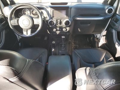 Zdjęcie 8 z 12 samochodu: 2013 JEEP WRANGLER UNLIMITED SAHARA VIN:1C4HJWEG6DL627248 - miniatura