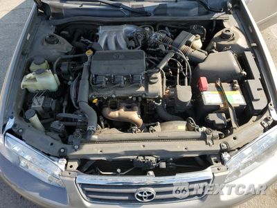 Zdjęcie 11 z 12 samochodu: 2001 TOYOTA CAMRY LE VIN:4T1BF22K71U127853 - miniatura