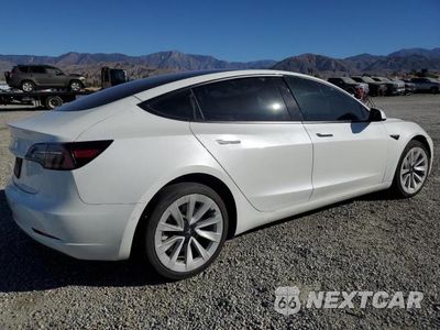 Trzecie zdjęcie samochodu z tyłu: 2021 TESLA MODEL 3 VIN:5YJ3E1EA9MF063840 - miniatura