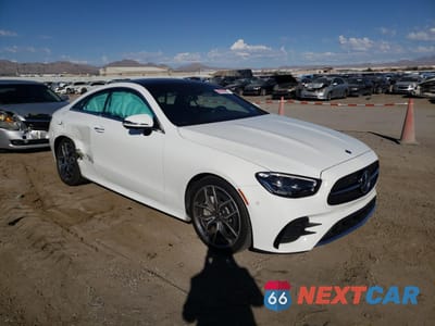 Czwarte zdjęcie samochodu z boku: 2021 MERCEDES BENZ E 450 VIN:W1K1J5JB9MF150969 - miniatura