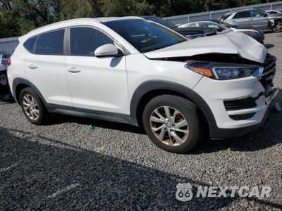 Czwarte zdjęcie samochodu z boku: 2021 HYUNDAI TUCSON LIMITED VIN:KM8J33A43MU288864 - miniatura