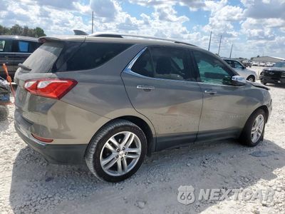 Trzecie zdjęcie samochodu z tyłu: 2019 CHEVROLET EQUINOX PREMIER VIN:3GNAXPEX6KS556010 - miniatura