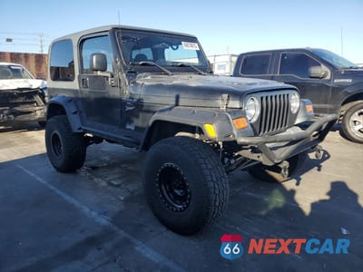 Czwarte zdjęcie samochodu z boku: 2001 JEEP WRANGLER / TJ SPORT VIN:1J4FA49S51P333140 - miniatura