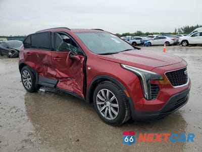 Czwarte zdjęcie samochodu z boku: 2019 CADILLAC XT4 SPORT VIN:1GYFZER40KF199063 - miniatura