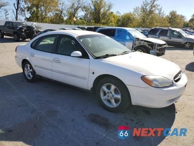Czwarte zdjęcie samochodu z boku: 2000 FORD TAURUS SES VIN:1FAFP5523YG208699 - miniatura
