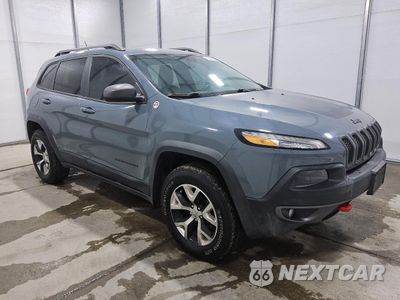 Czwarte zdjęcie samochodu z boku: 2014 JEEP CHEROKEE TRAILHAWK VIN:1C4PJMBS8EW201876 - miniatura