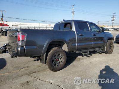 Trzecie zdjęcie samochodu z tyłu: 2023 TOYOTA TACOMA DOUBLE CAB VIN:3TMDZ5BN3PM143626 - miniatura